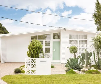 An all-white mid-century home