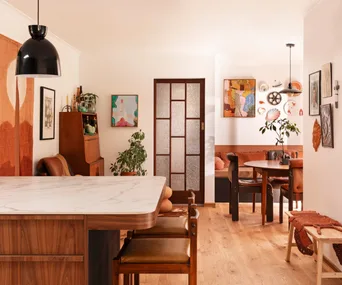 blackwood-bungalow-japanese-inspired-dining-living-area-orange-tones