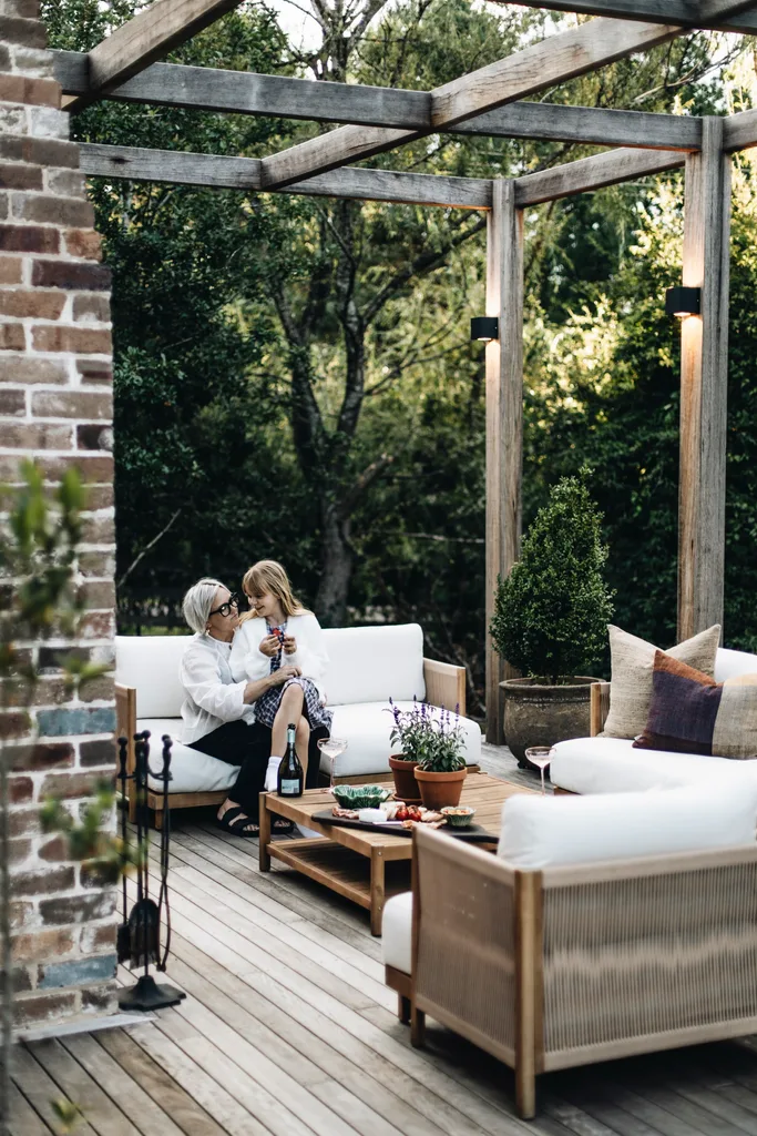 Homeowner Beth and her daughter sitting in the alfresco area