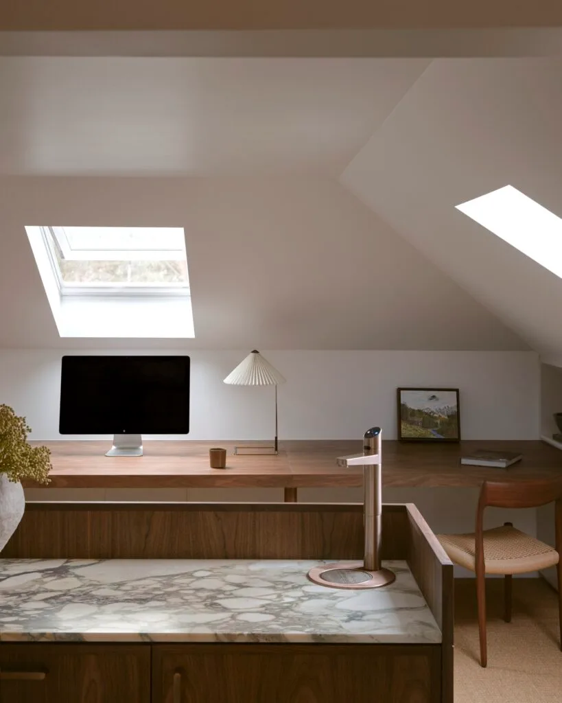 A timber and marble study with skylights