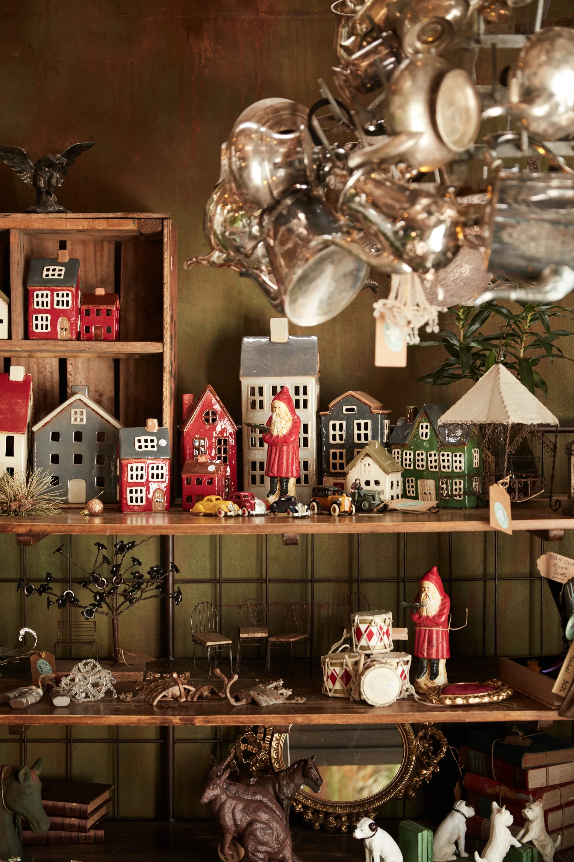 Timber shelves filled with ceramic Christmas trinkets