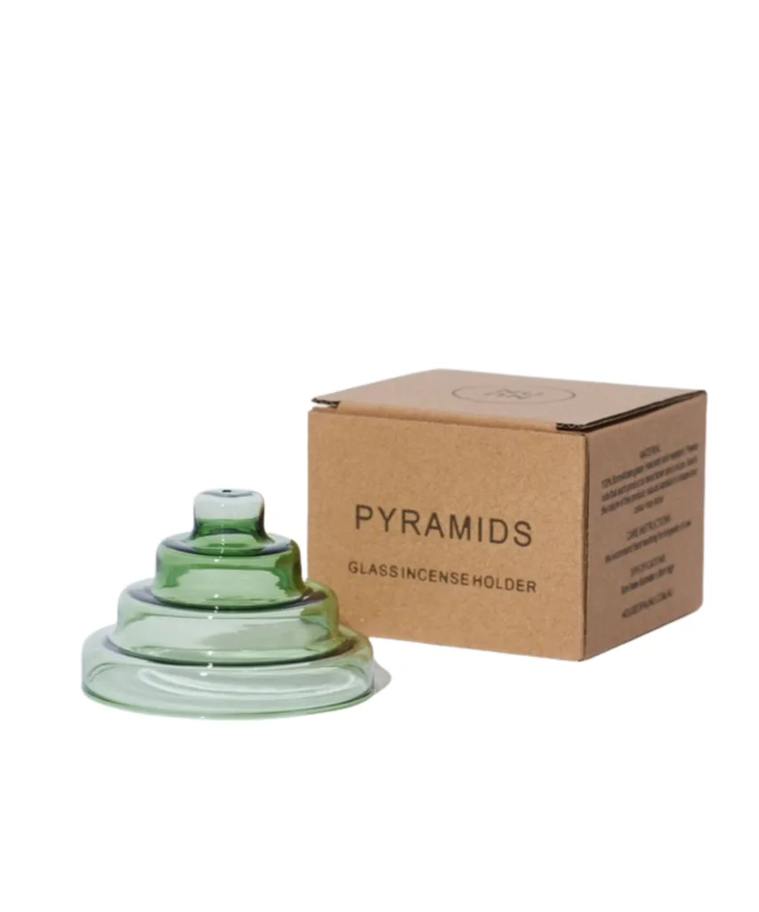 Green glass pyramid-shaped incense holder