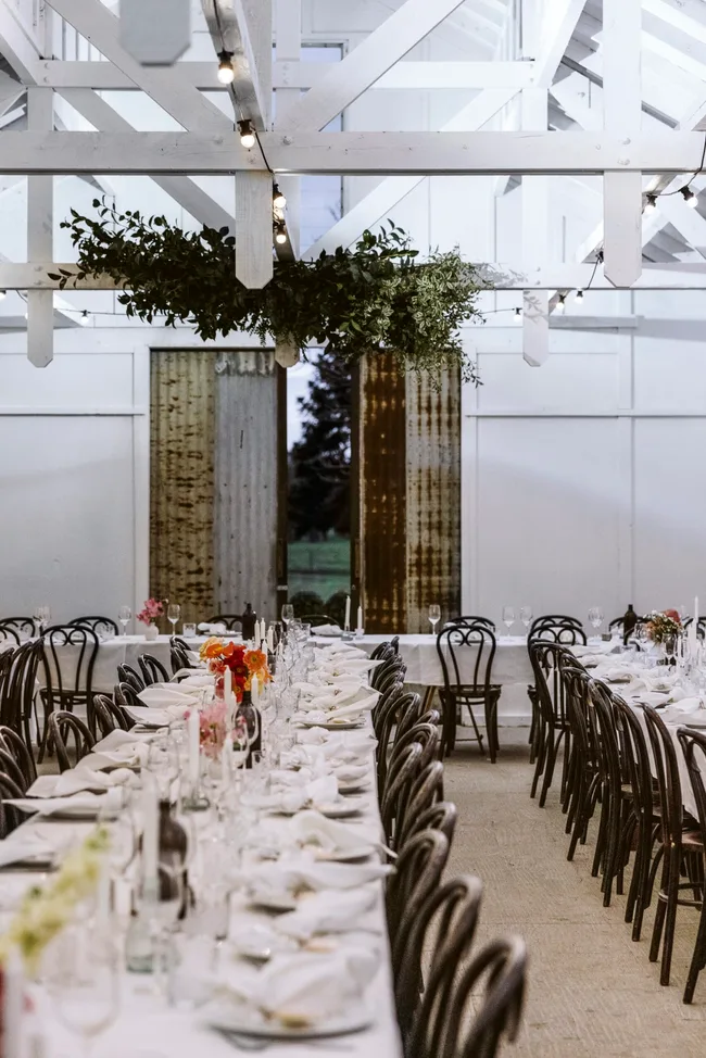 Lucy and Jack's reception in a white-washed barn