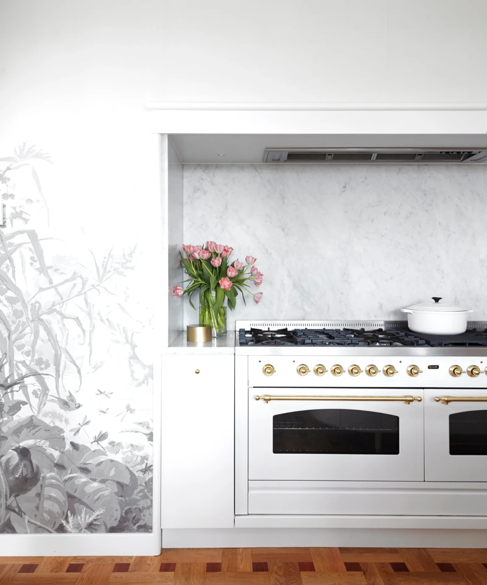 Marble kitchen with flowers on benchtop
