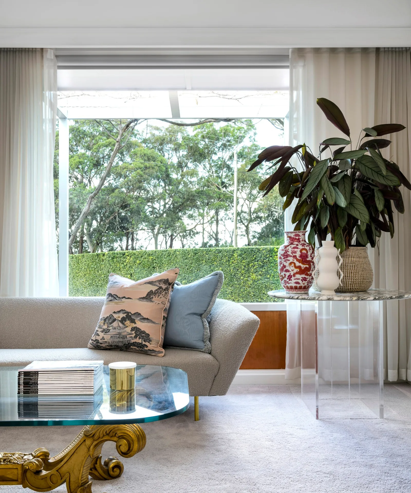 Modern lounge room with floor-to-ceiling windows