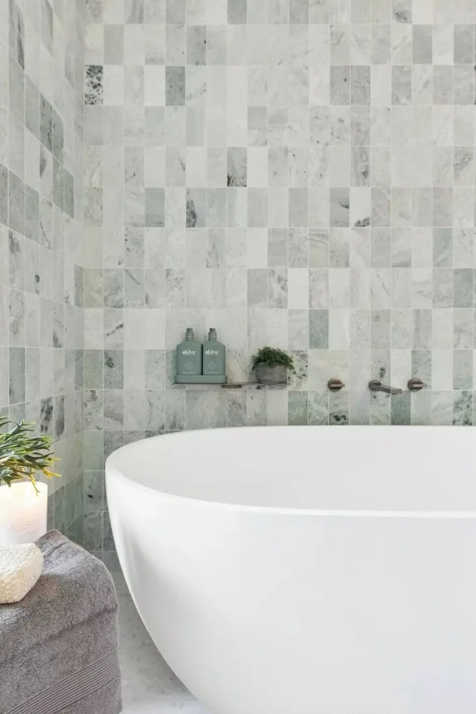 green tiles in light bathroom