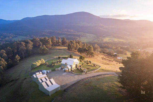 A storybook country home in regional Tasmania, set amongst rolling hills and paddocks.