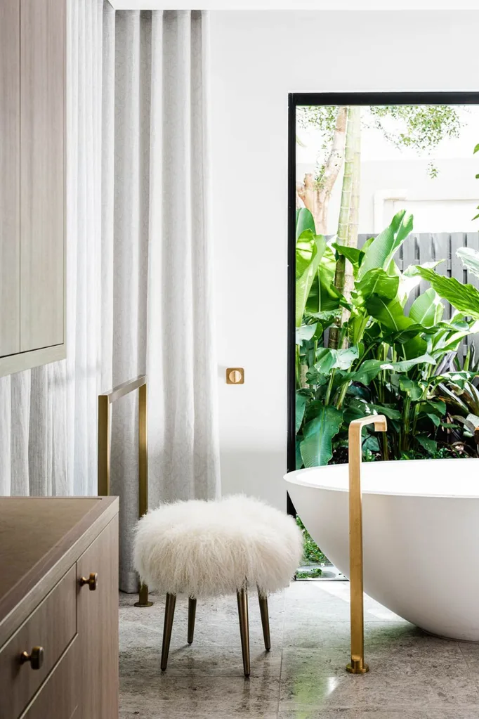 Rogerseller tapware feature in light and bright bathroom