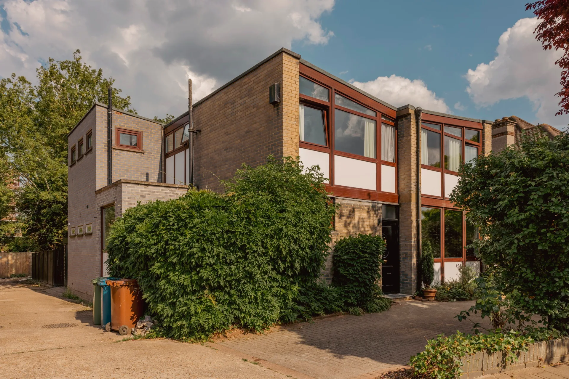 The brick exterior of a mid-century home in London