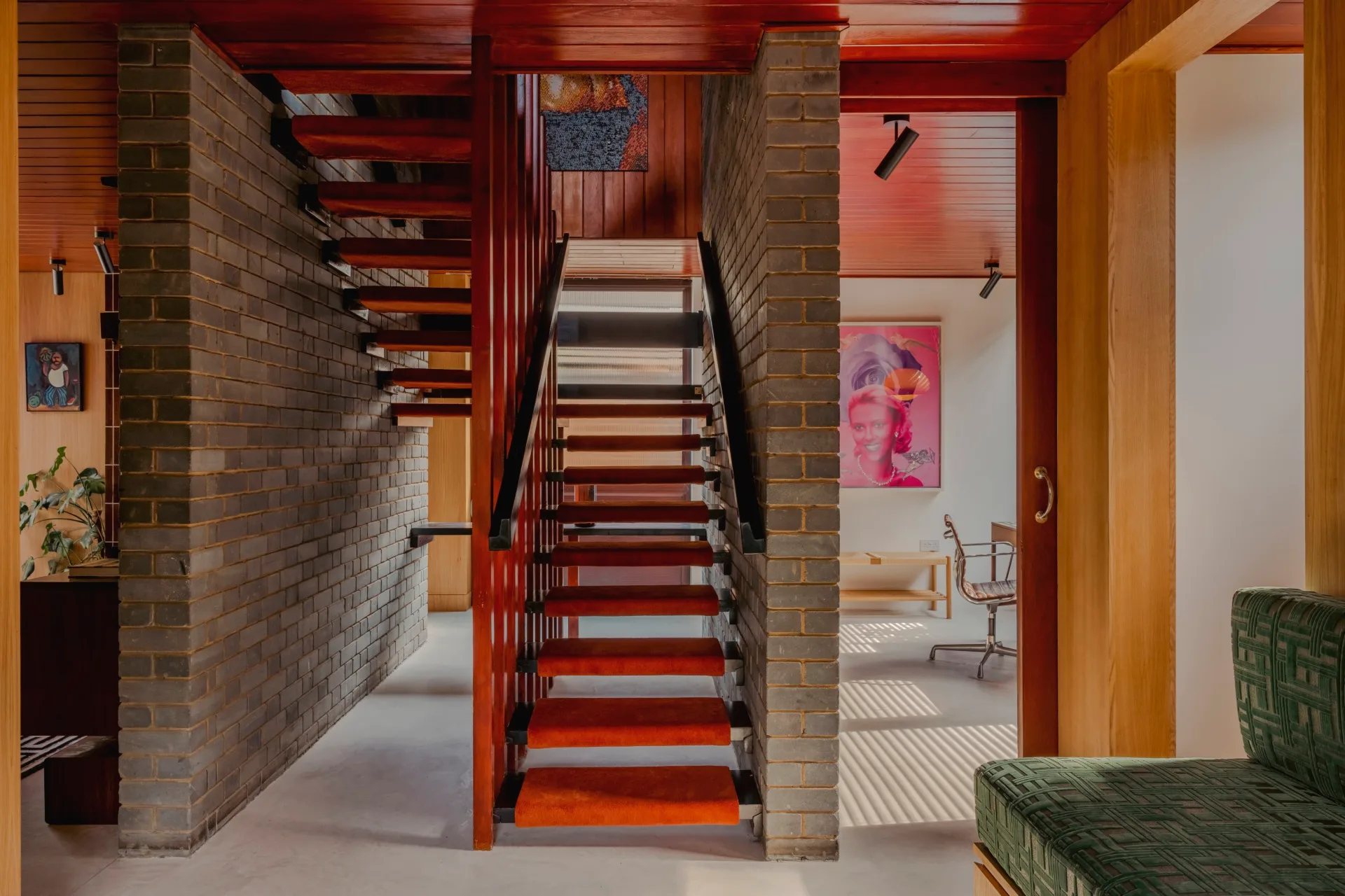 A floating staircase in a mid-century home