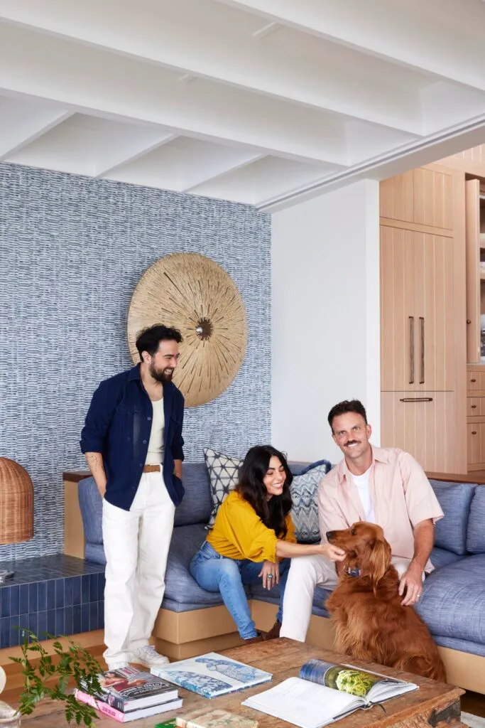 Stylist Jono Fleming with homeowner and TV chef Silvia Collocca and interior designer Ryan McGregor with Silvia's dog Mabel