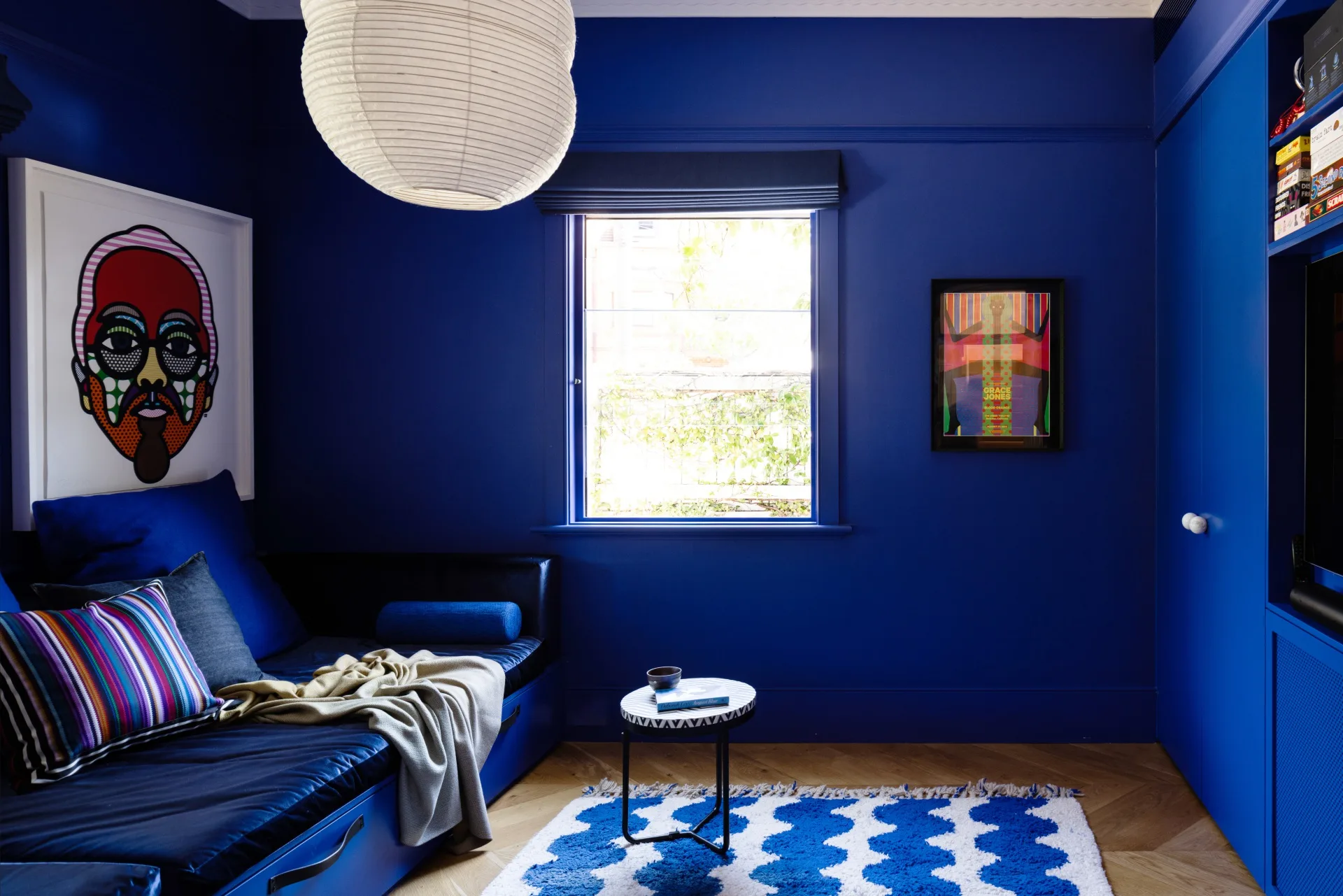 A cobalt blue movie room