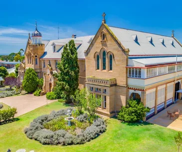 The grand sandstone facade of a former convent in Warwick, Queensland