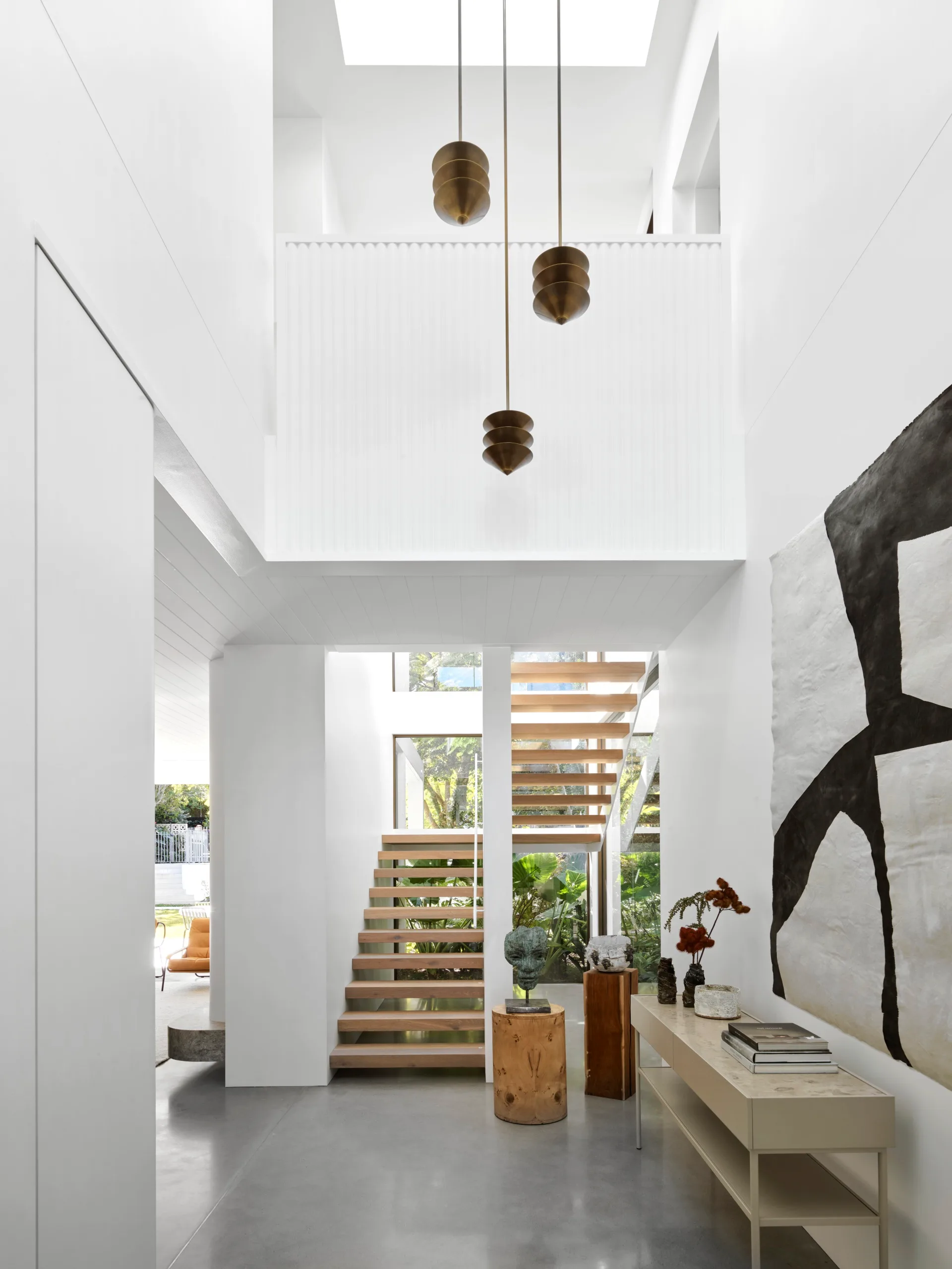 contemporary-palm-springs-mid-century-entertainer-staircase-open-pendant-light