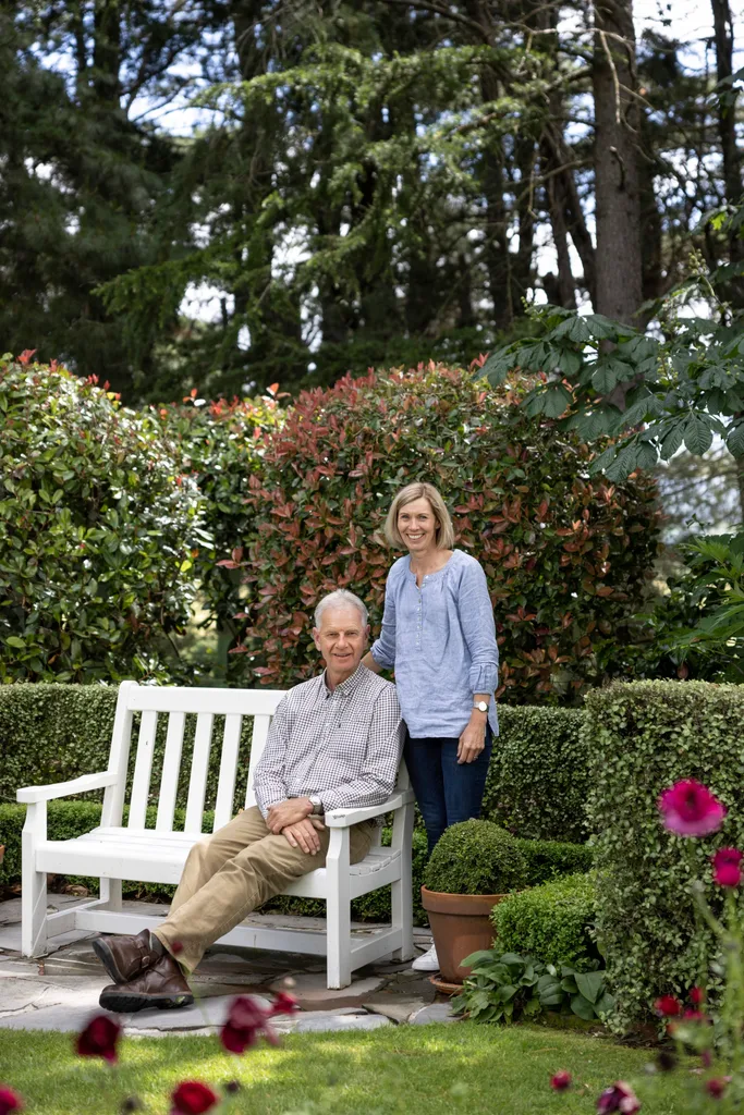 Anita and her husband Richard in their leafy garden