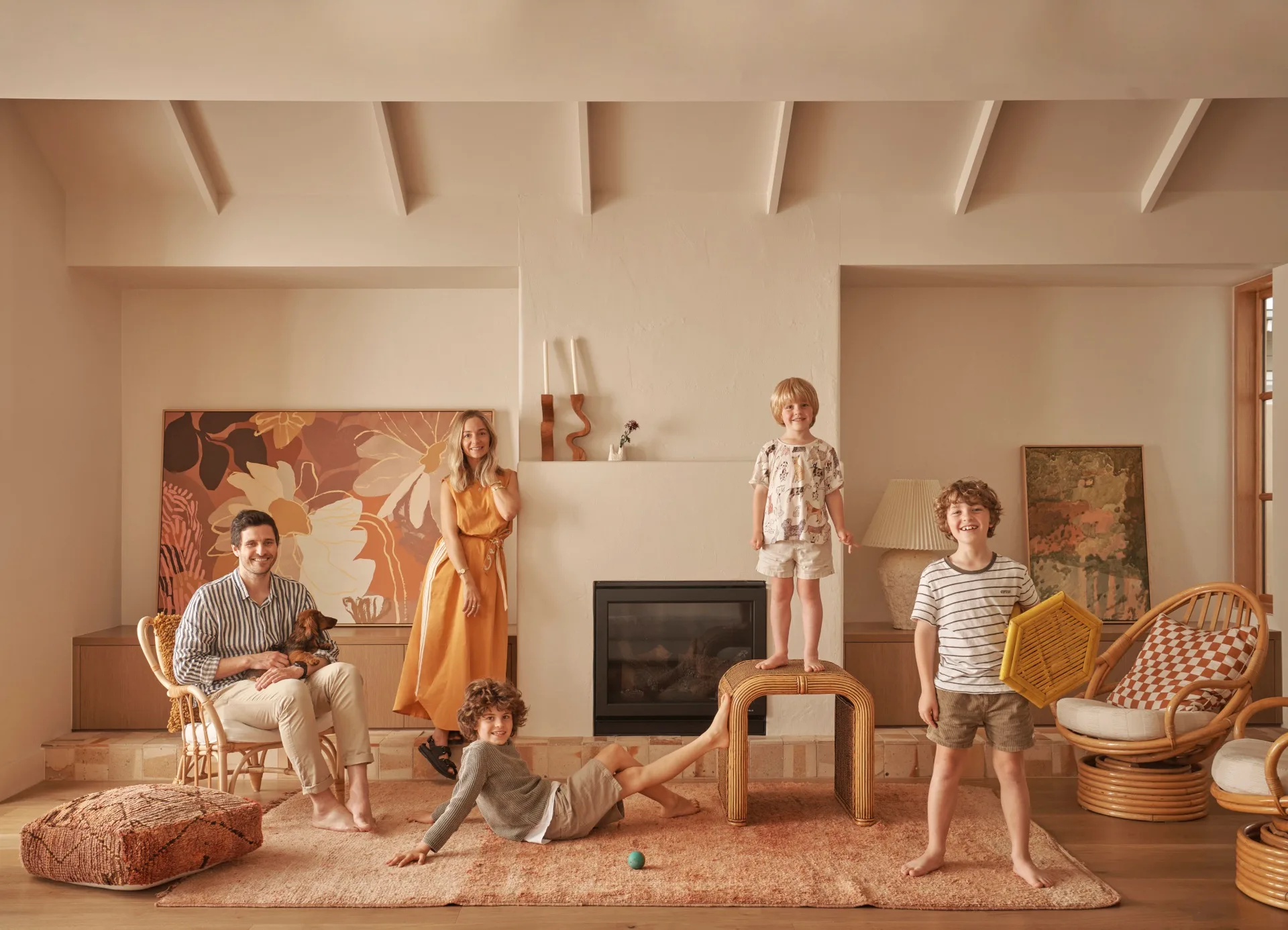 A family portrait in Kimmy Hogan's neutral toned home in East Geelong