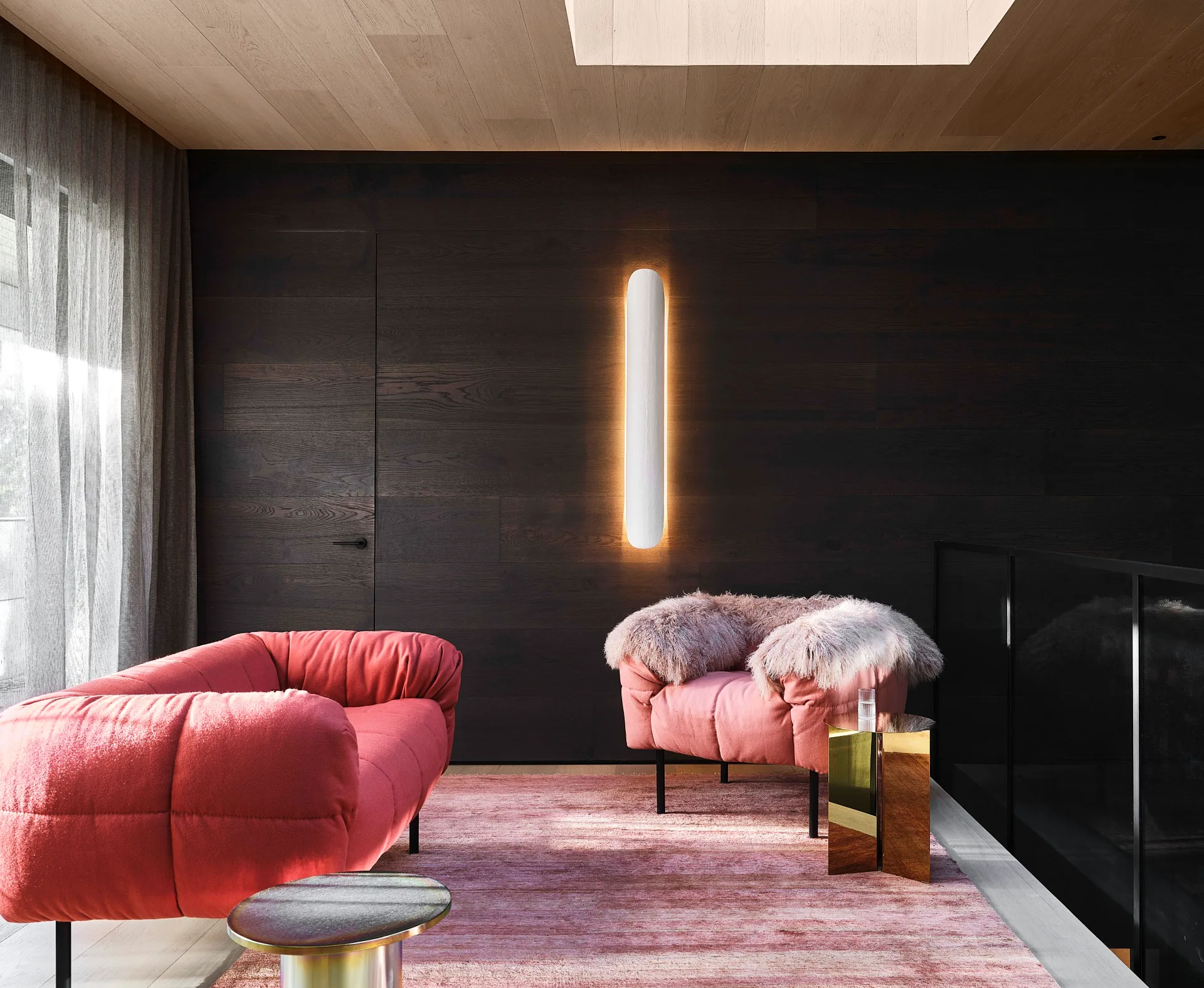 Moody materials in eye-popping shades - pink couch