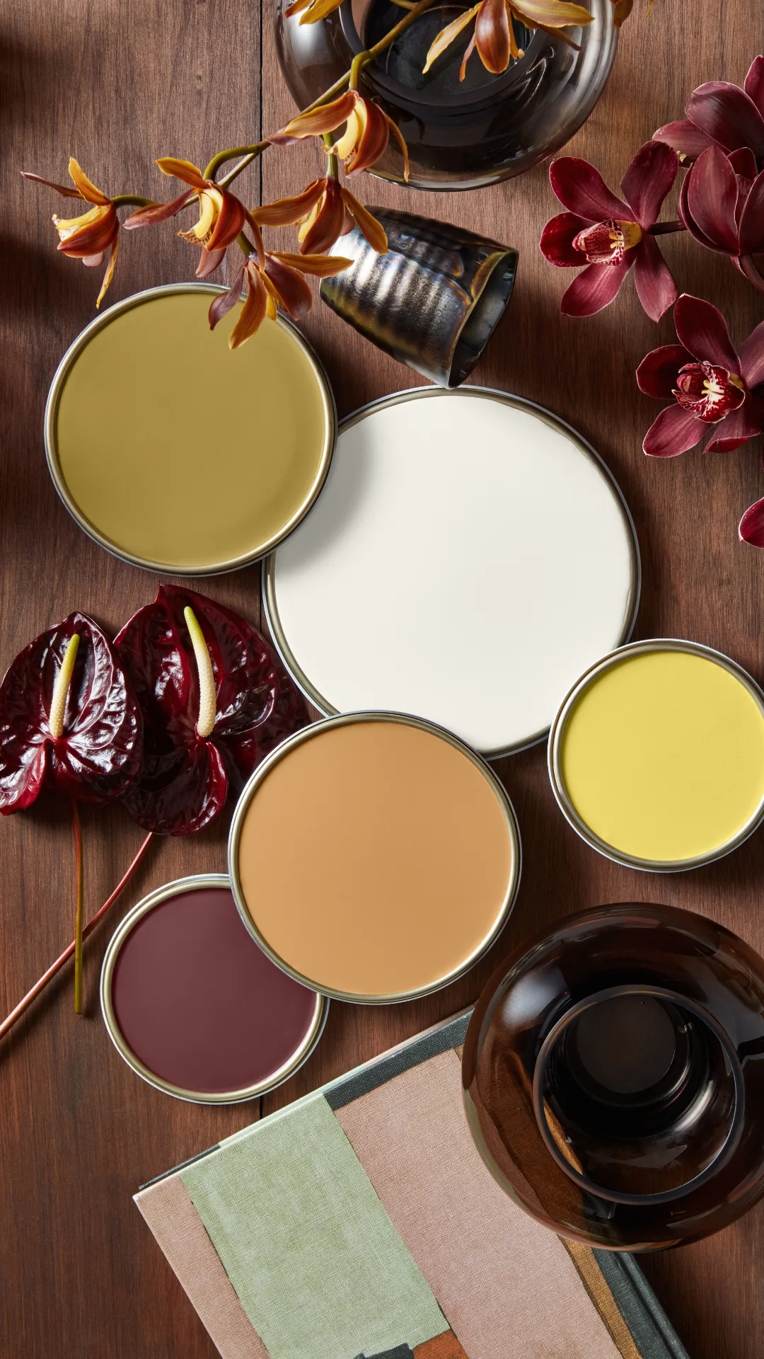 Paint palette of white, deep red, moss, bright yellow