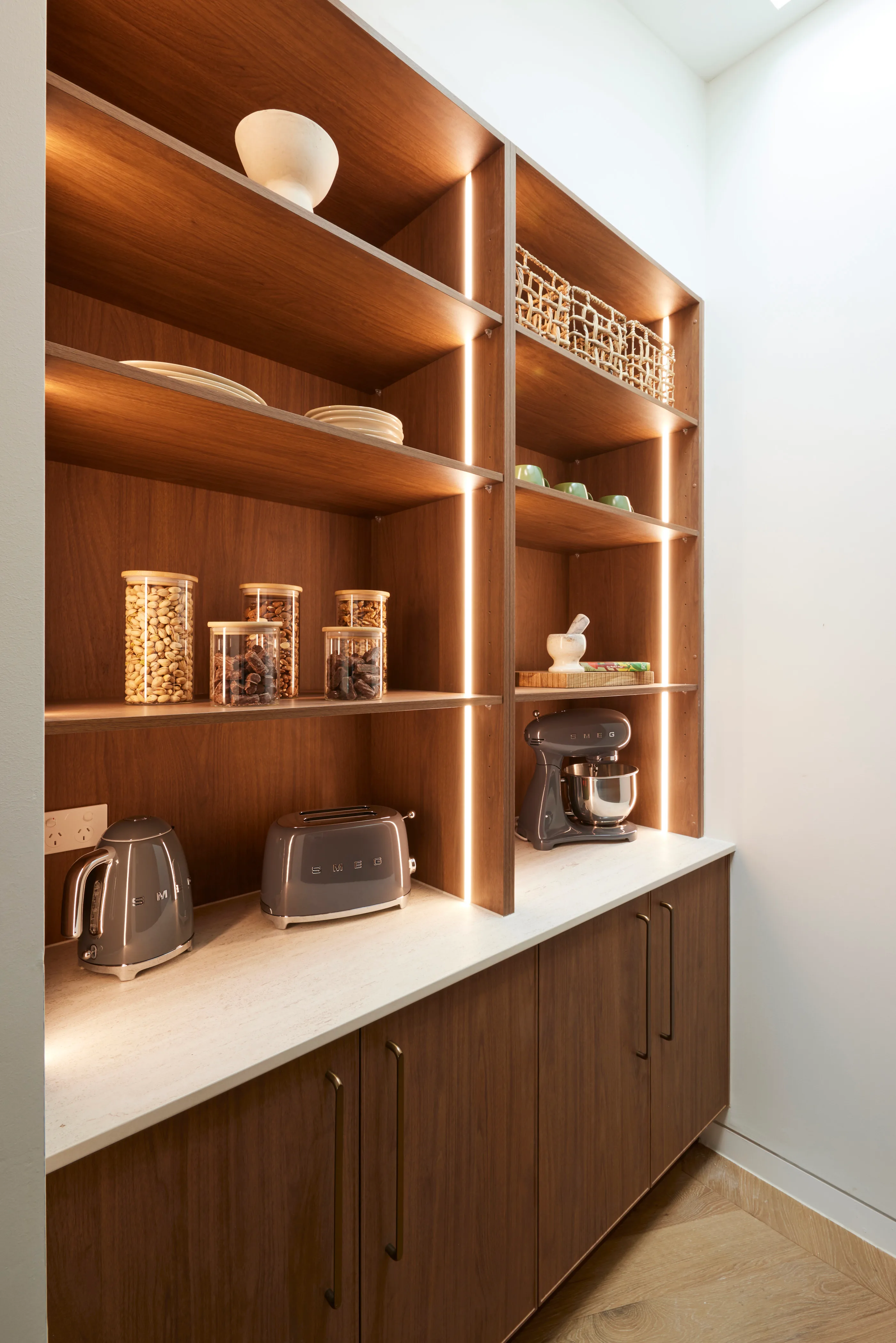 A timber butler's pantry with Smeg appliances