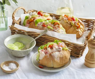 Yabby rolls in a basket with cucumber, salt and pepper