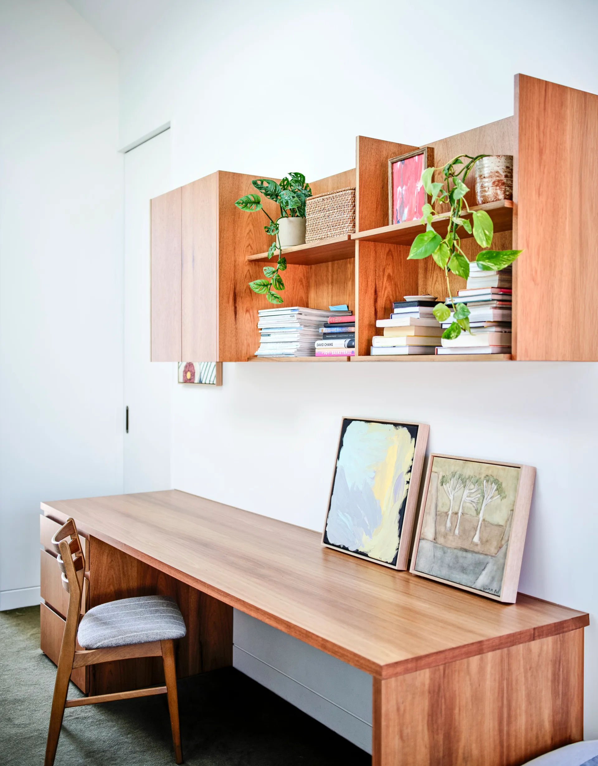 A timber study with a floating shelf