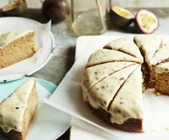 A slice banana cake with passionfruit icing