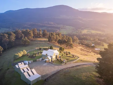 A storybook country home in regional Tasmania, set amongst rolling hills and paddocks.