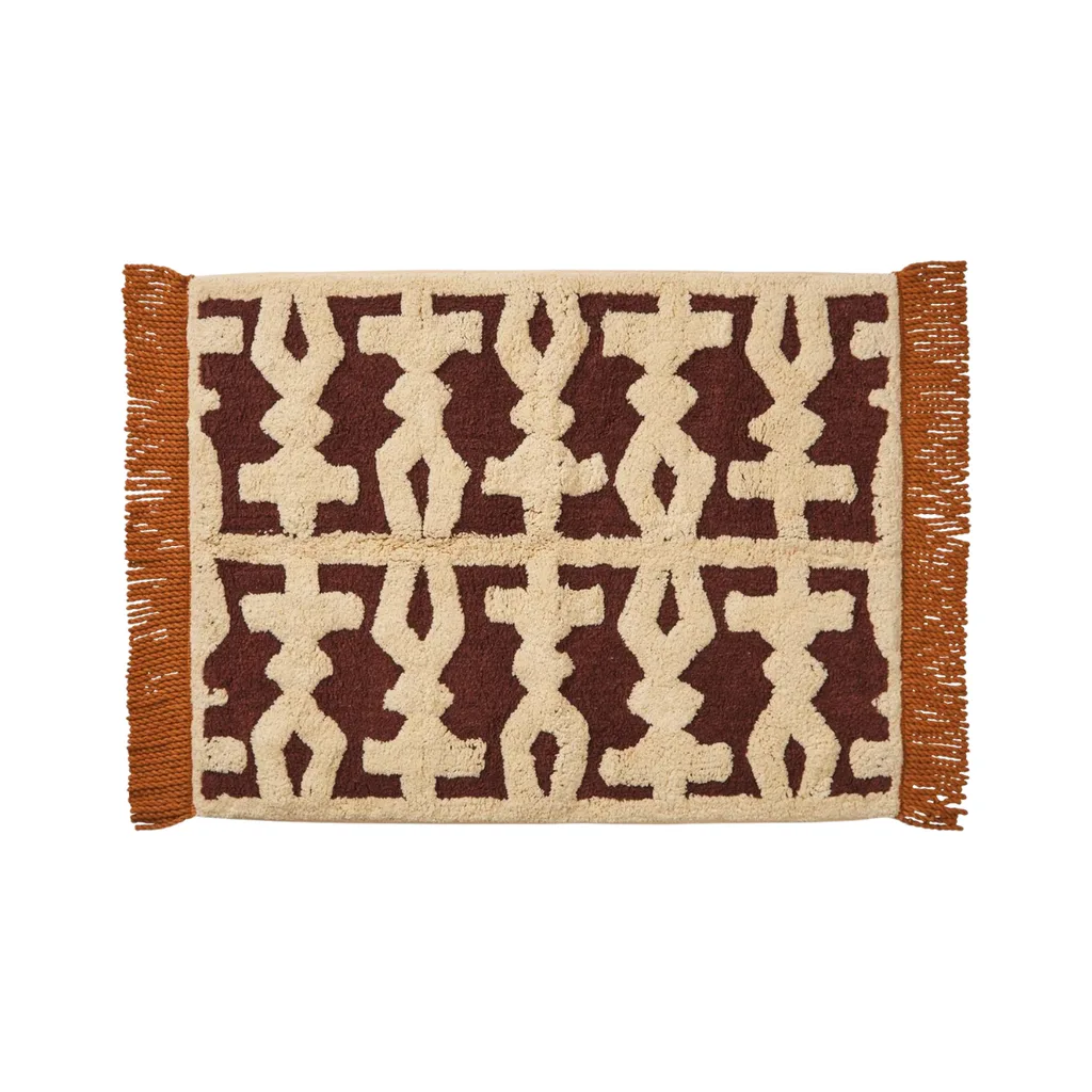 hand-tufted brown and beige bath mat from Sage x Clare