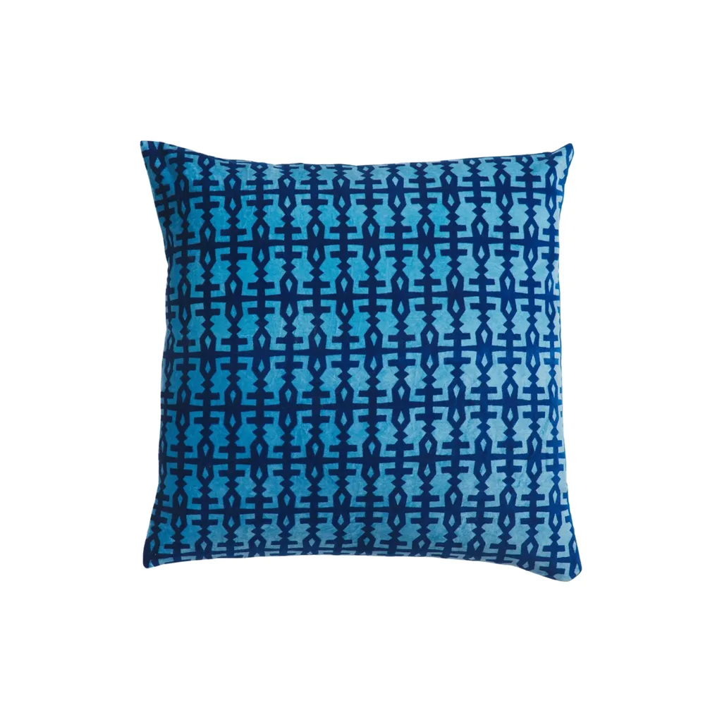 A blue pillow from Sage x Clare