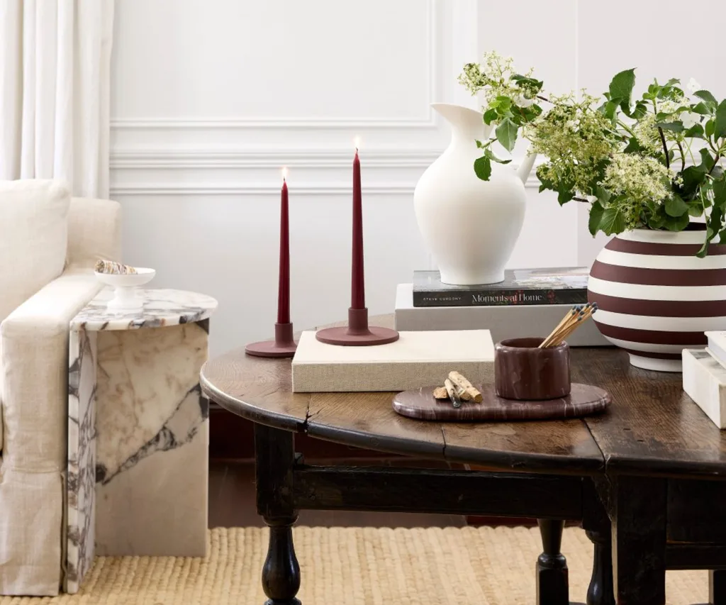 A timber dining table topped with decor from Seed Heritage
