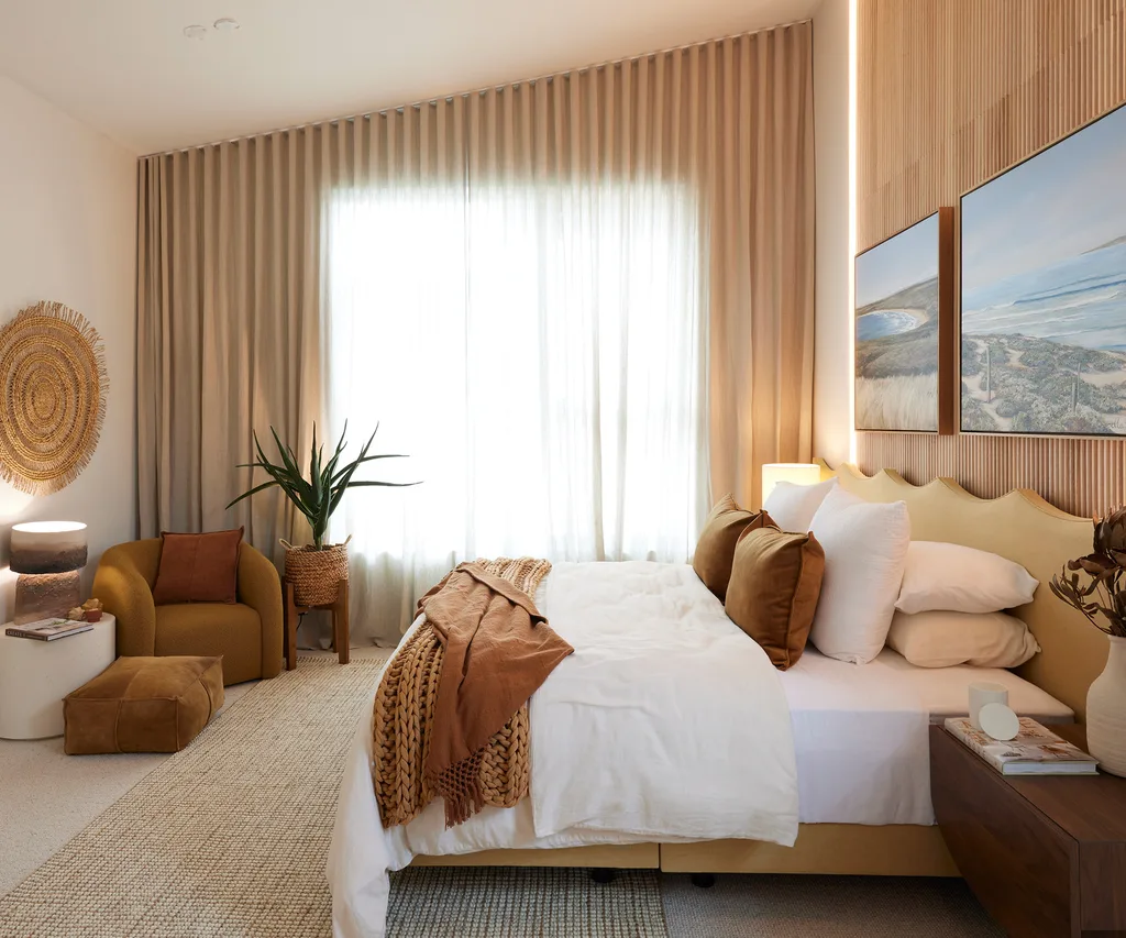A bedroom from The Block with a dramatic wall of sheer curtains.