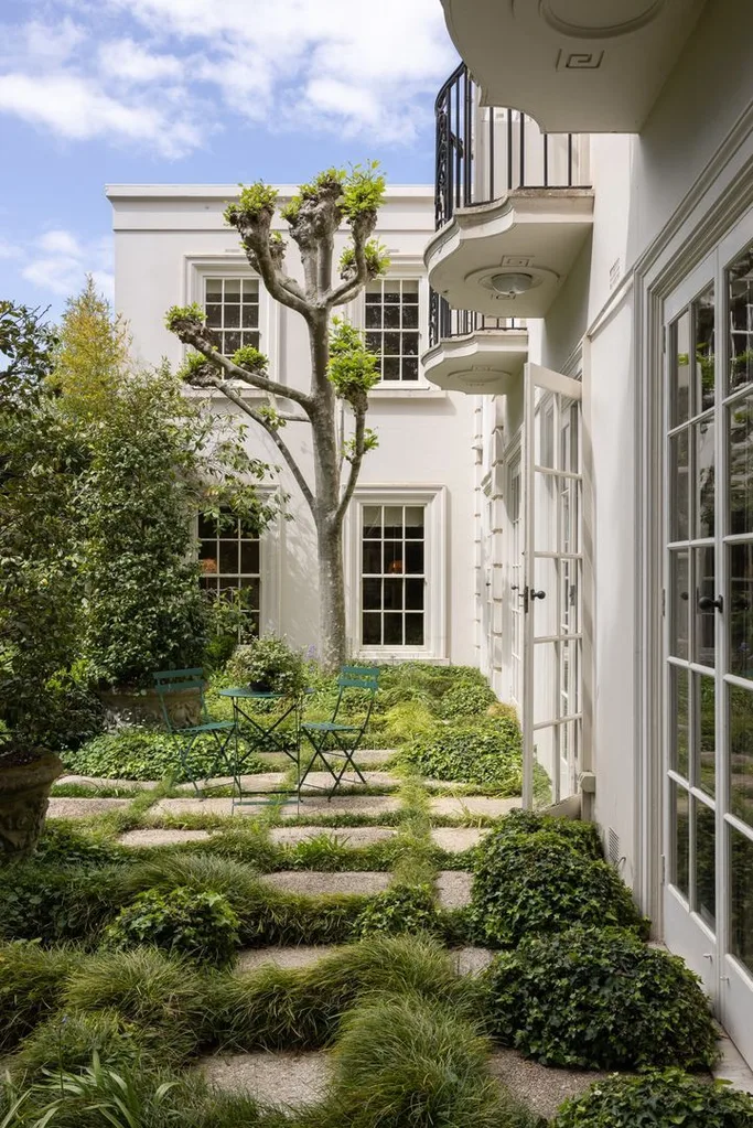 A leafy garden on the grounds of the Myer family manor