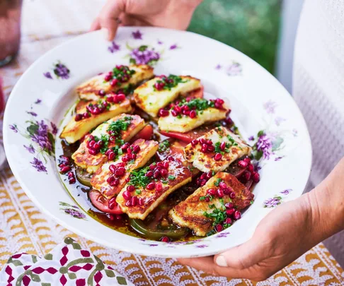 Simple summery grilled halloumi with za’atar, tomatoes and pomegranate