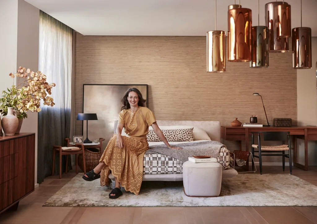 Interior designer, Kate Nixon in a bedroom
