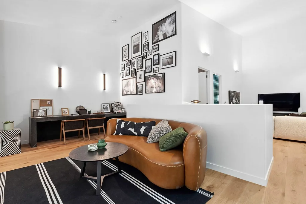 Kylie and Brad's mezzanine lounge space and office from The Block