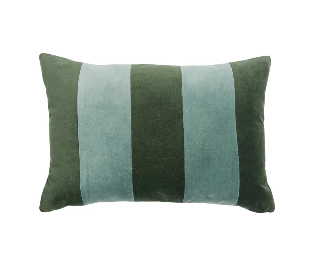 A green and blue striped velvet cushion