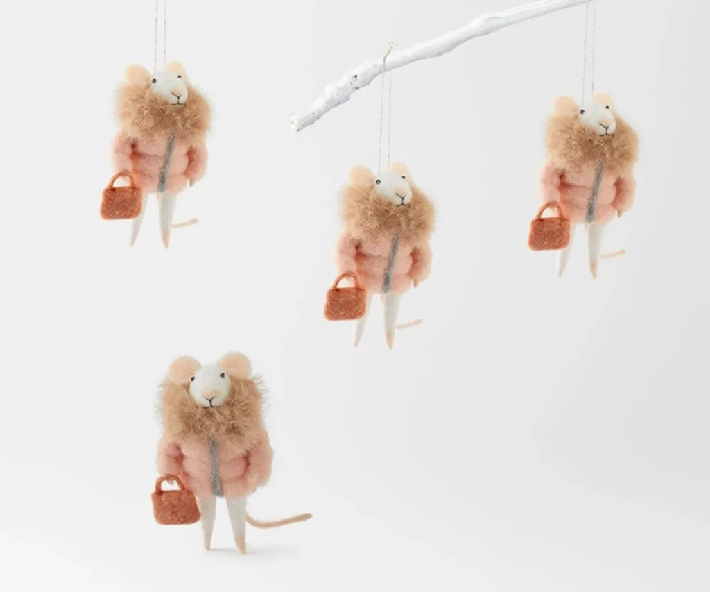 Tiny mouse wearing coat and bag ornaments from Bed Bath N' Table