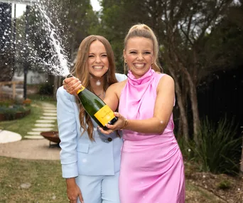 Maddy and Charlotte celebrating their Block 2024 victory