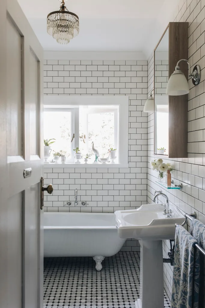 Country-style bathroom with antique claw-foot bath