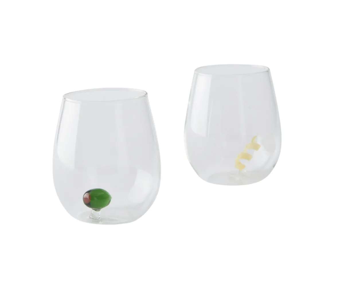 Two stemless wine glasses with glass ornaments inside