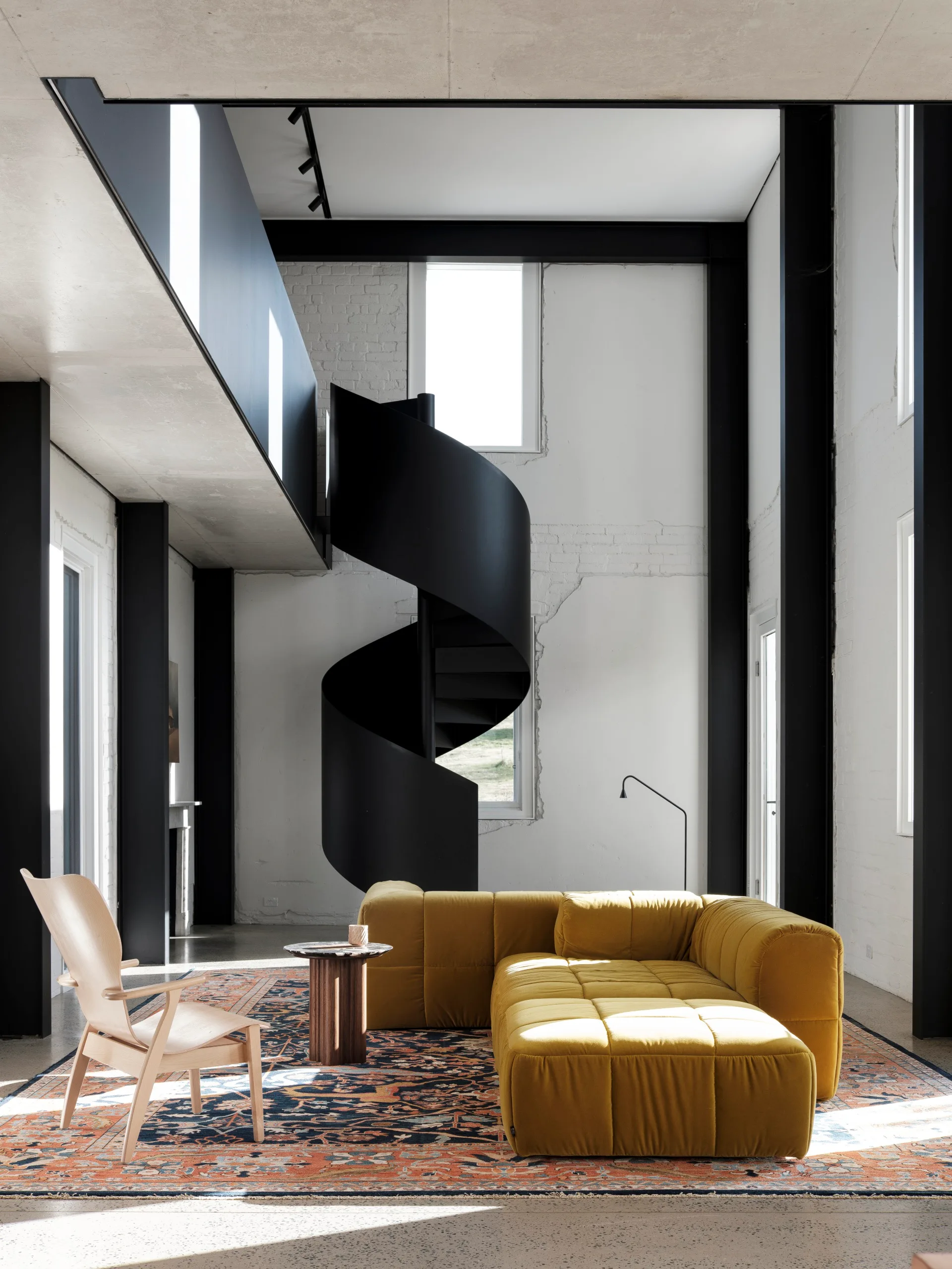 Southern NSW homestead helical staircase yellow couch