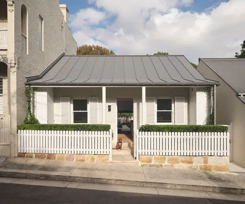 A Woollahra terrace home provides a quiet backdrop for colourful art