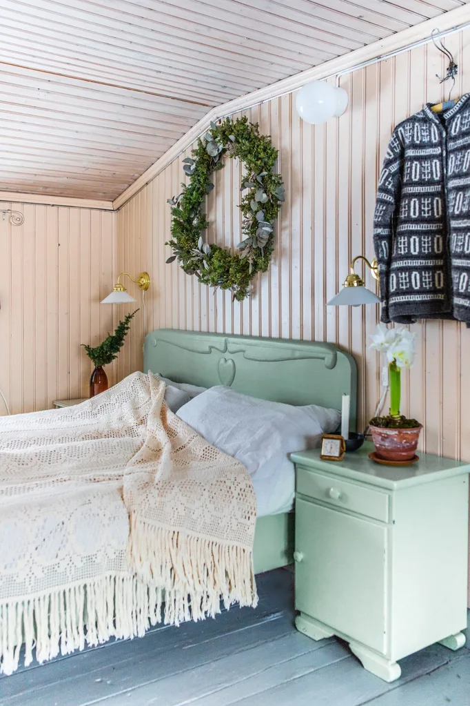 Christmas wreath above bed