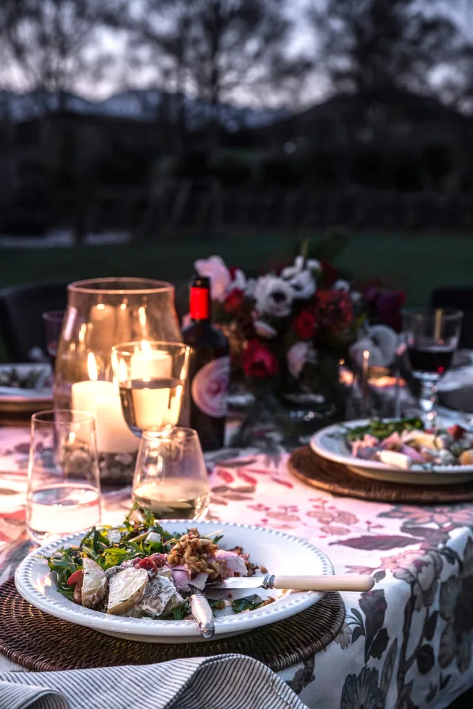 A Christmas table at dusk.
