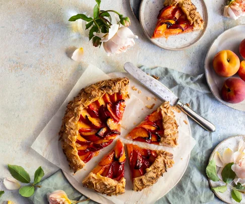 Tilly Pamment’s buttery peach and almond galette