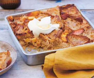 Bread and butter pudding with peaches and Baileys Irish Cream