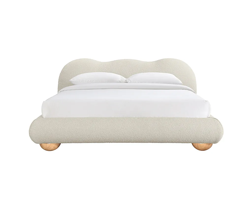 A rounded cloud-like bed with round joinery from Freedom