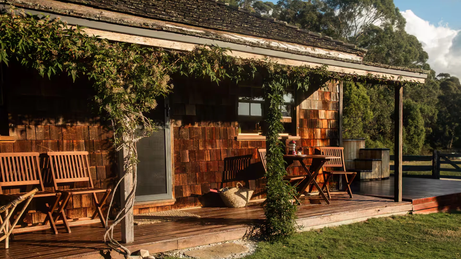 The exterior of a cottage with a verandah
