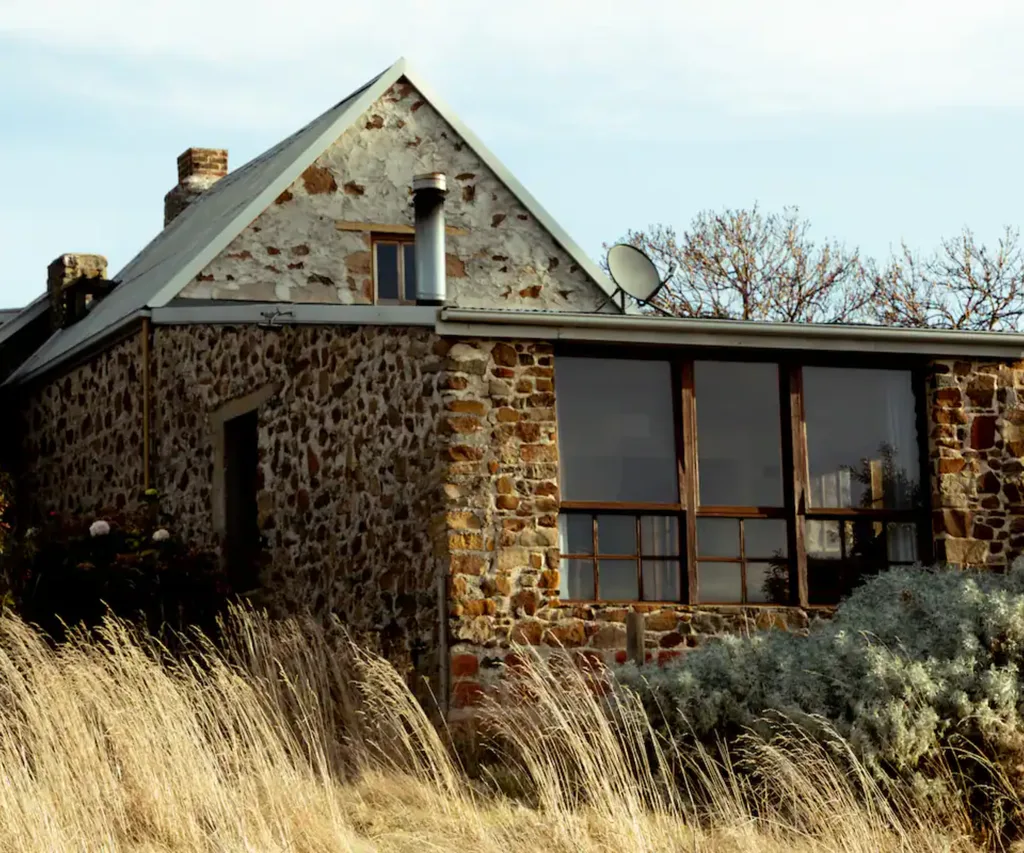 The stone exterior of Shepherd Cottage in Little Swanport
