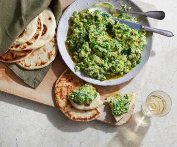 Zucchini, ricotta and pea dip with flatbreads